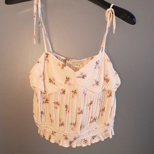 American Eagle crop top.  Size Small.  Cream and pink  Speghetti straps